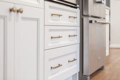 White kitchen built with shaker style cabinets